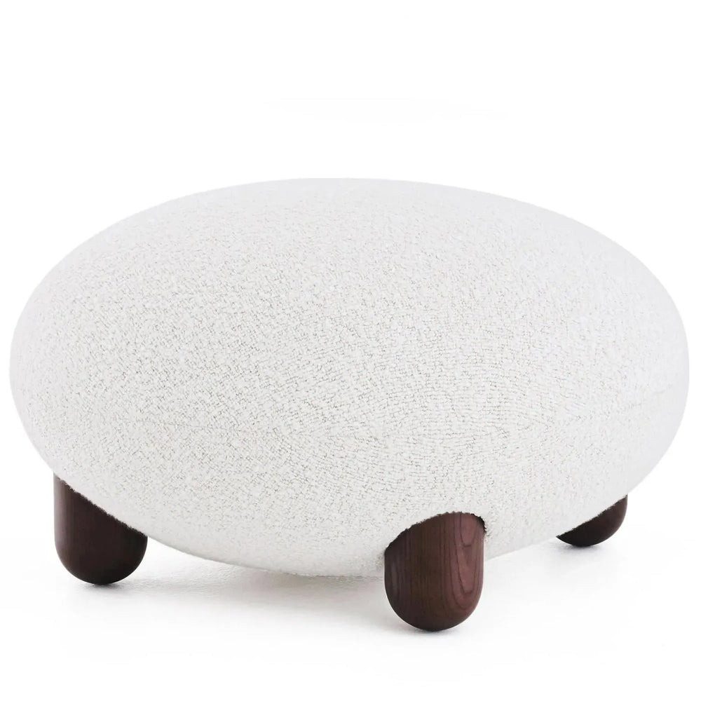 Cream fabric ottoman teddy in white background.