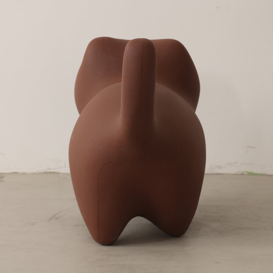 Contemporary plastic ottoman cat in details.