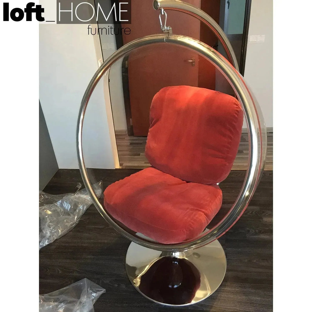 Contemporary plastic rocking chair 1 seater sofa bubble with context.