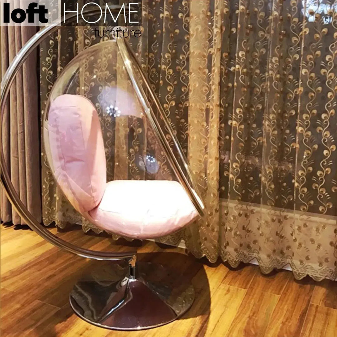 Contemporary plastic rocking chair 1 seater sofa bubble in still life.