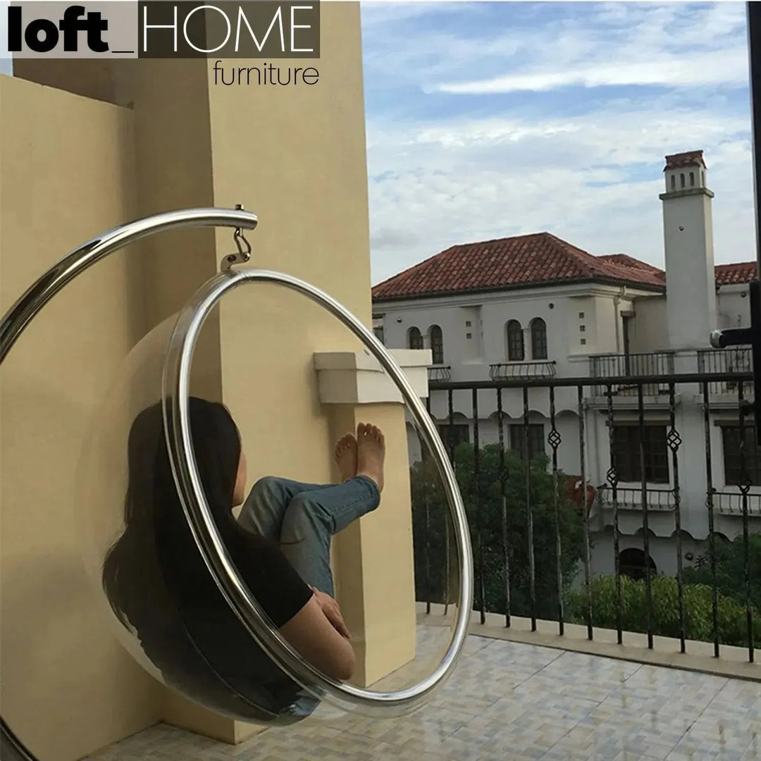 Contemporary plastic rocking chair 1 seater sofa bubble in real life style.