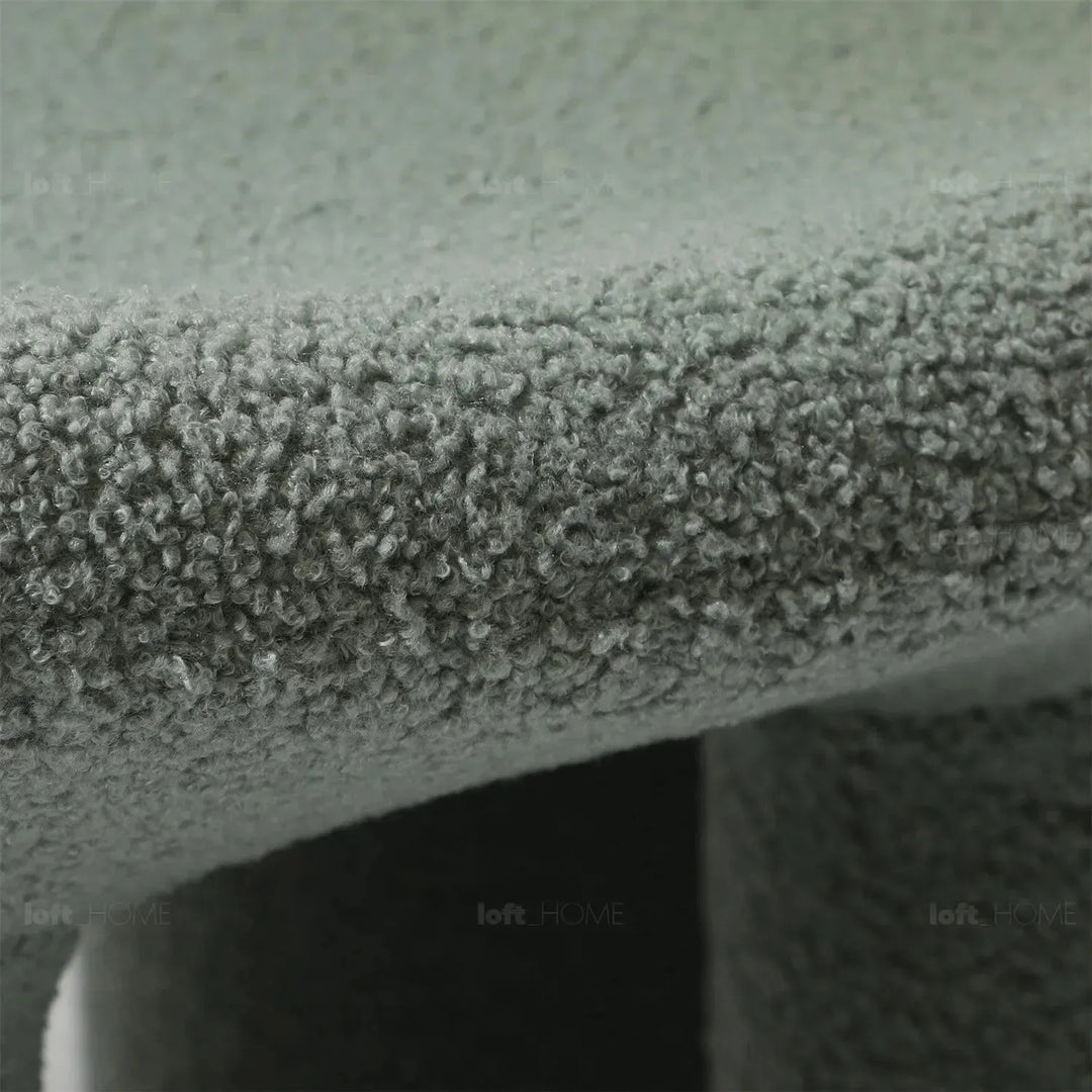 Cream boucle 1 seater sofa mibster layered structure.