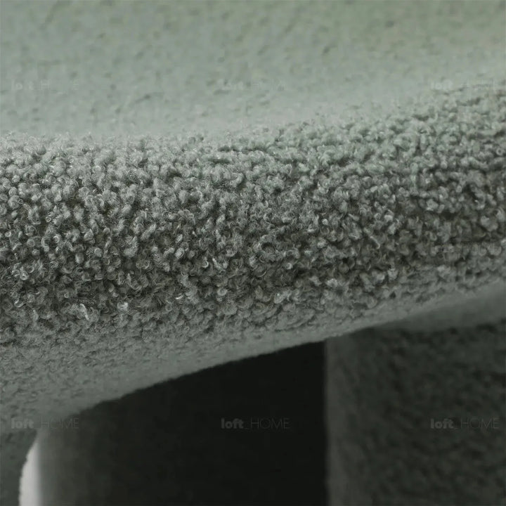 Cream boucle 1 seater sofa mibster layered structure.