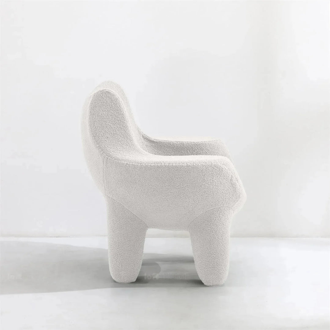 Cream boucle 1 seater sofa mibster in real life style.