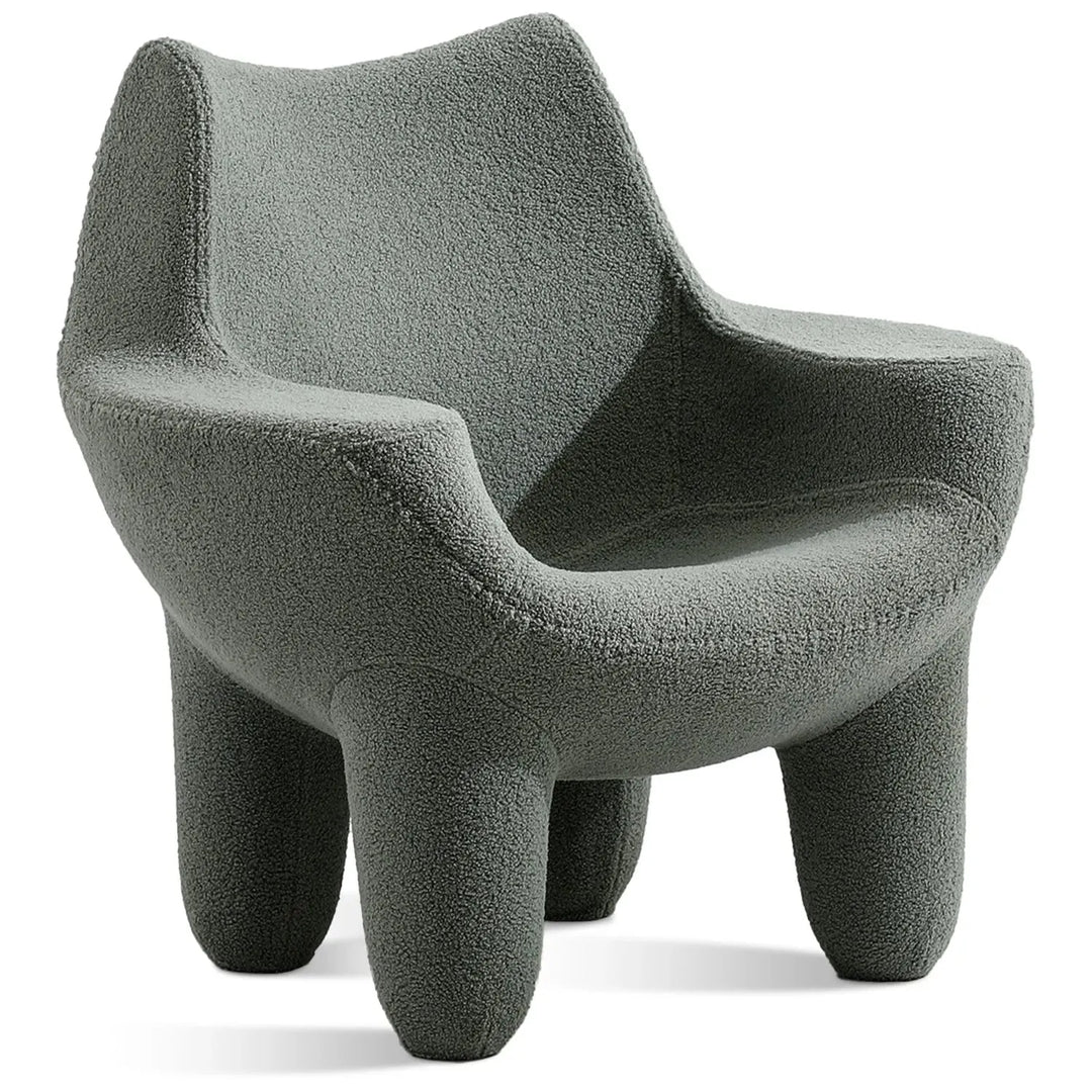 Cream boucle 1 seater sofa mibster in panoramic view.