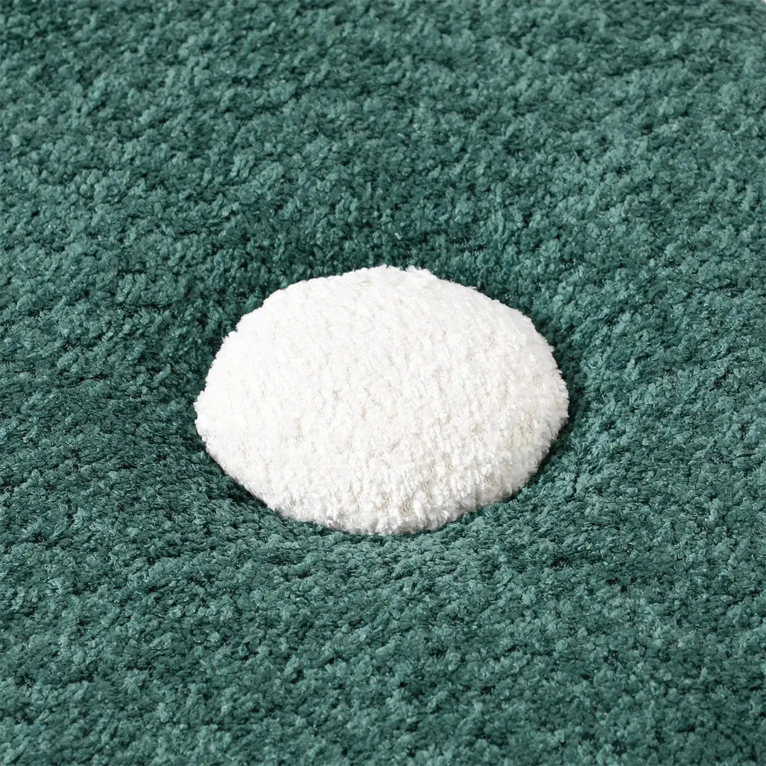 Cream boucle ottoman fish in details.