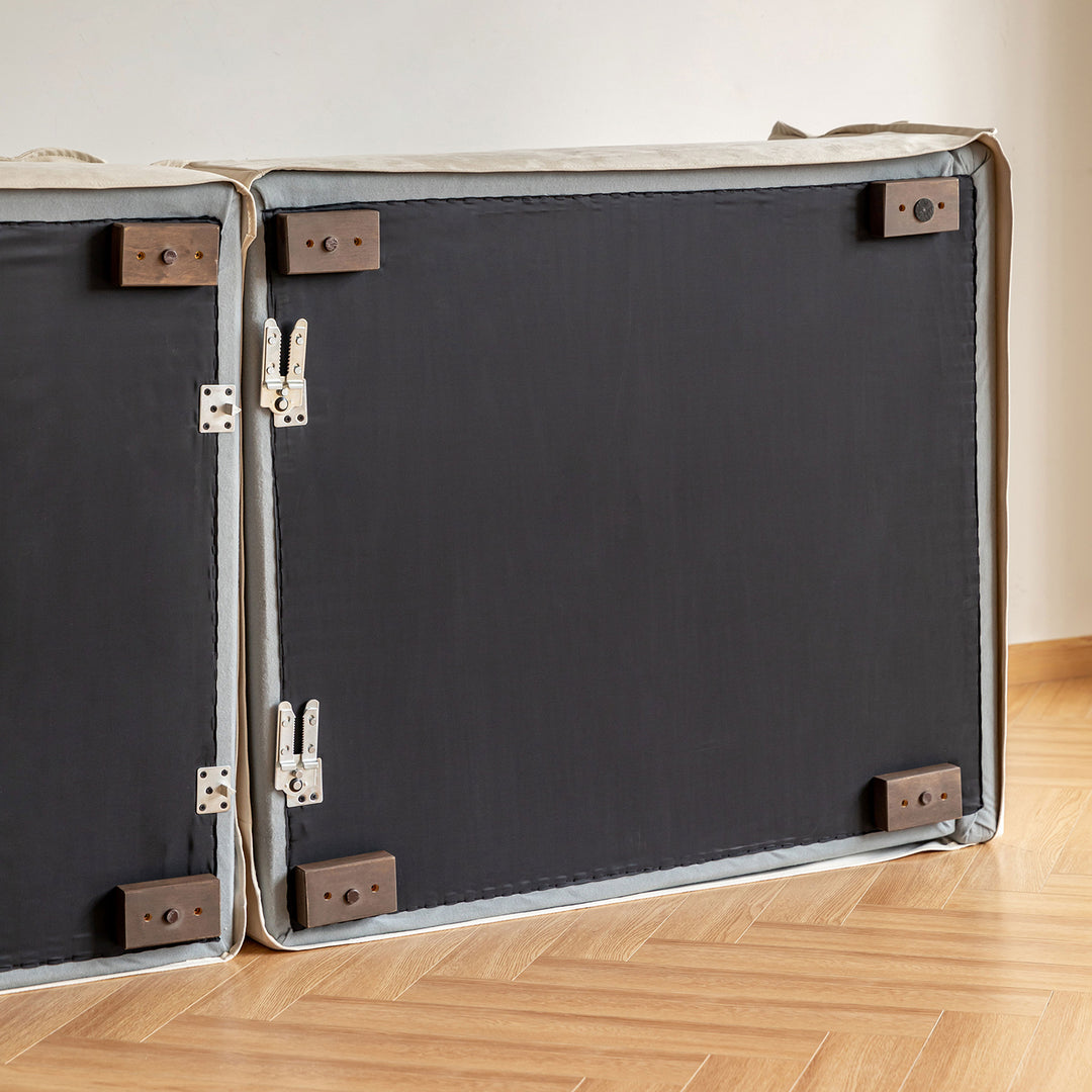 Cream cotton fabric 1 seater sofa folding ear in panoramic view.