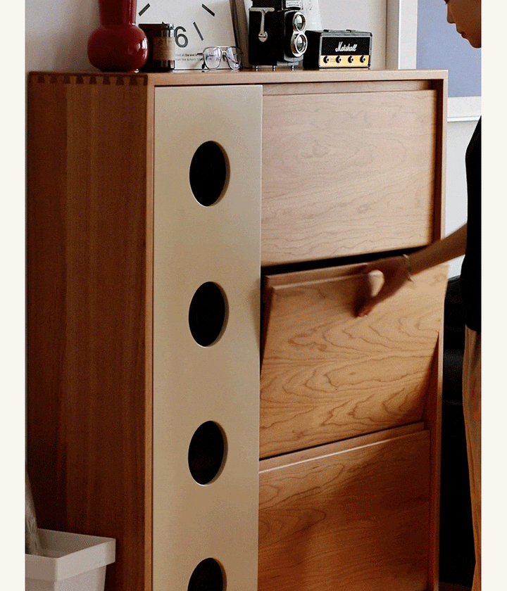 Scandinavian cherry wood shoe cabinet timeless in still life.