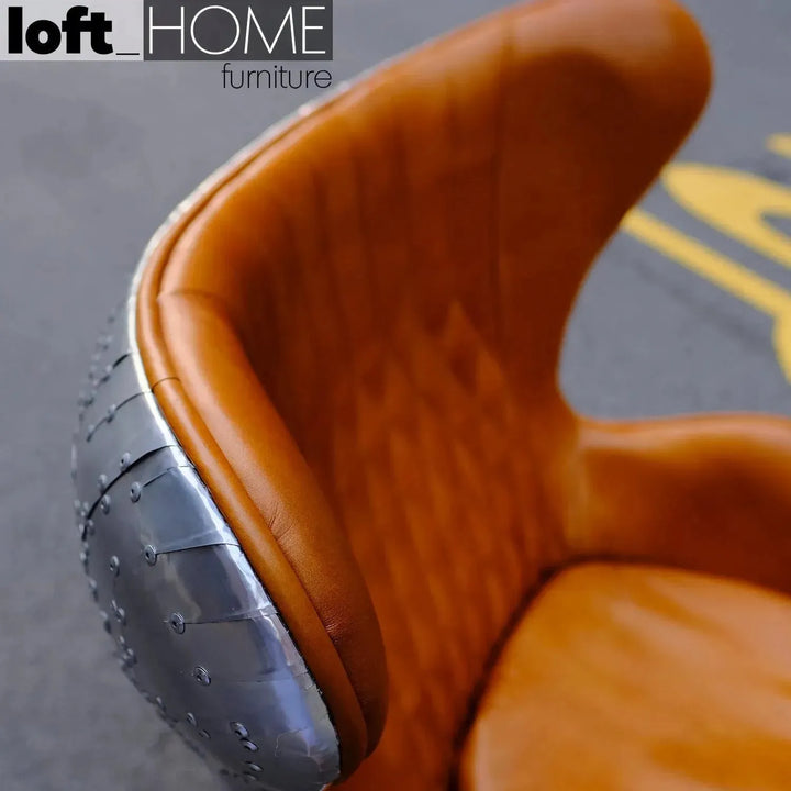 Industrial aluminium 1 seater sofa egg with context.