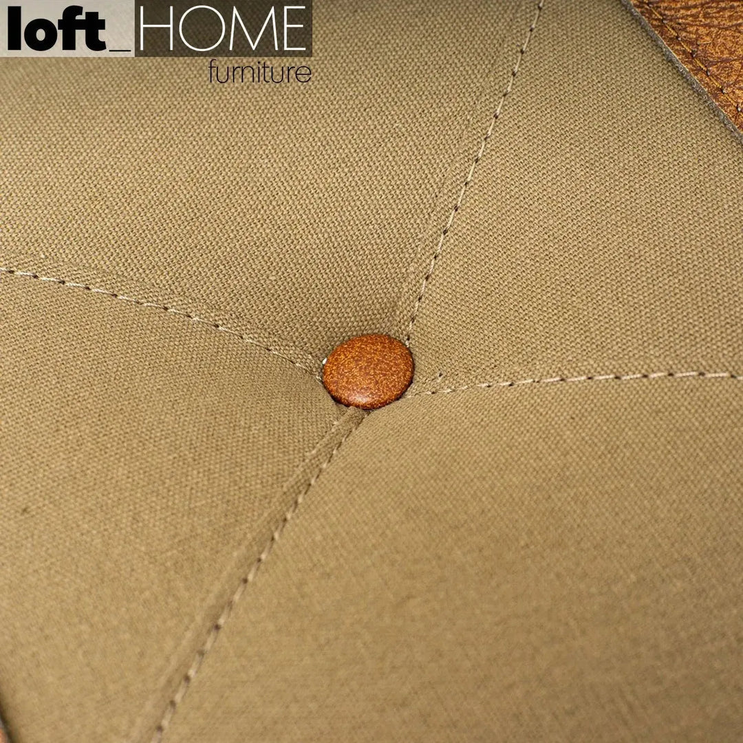 Vintage canvas ottoman stool travel in close up details.