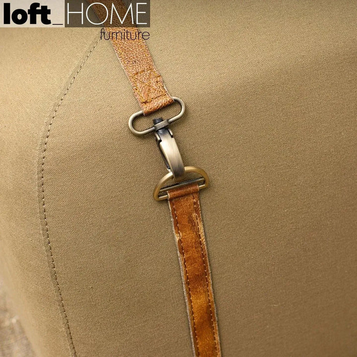 Vintage canvas ottoman stool travel in details.