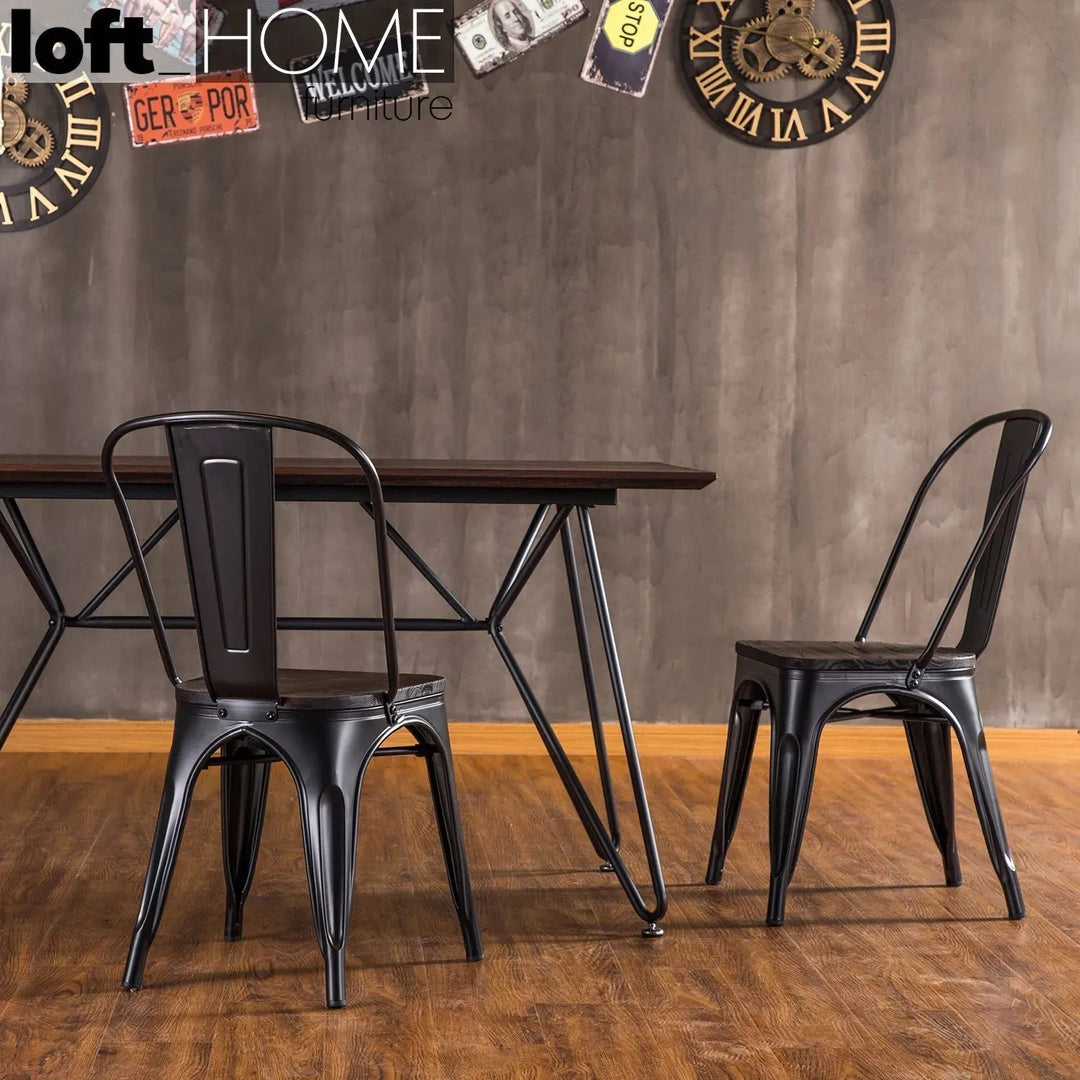 Industrial elm wood dining chair sanctum x in still life.