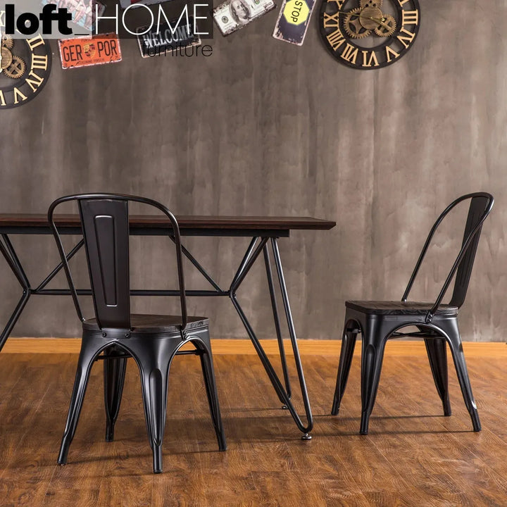 Industrial elm wood dining chair sanctum x in still life.