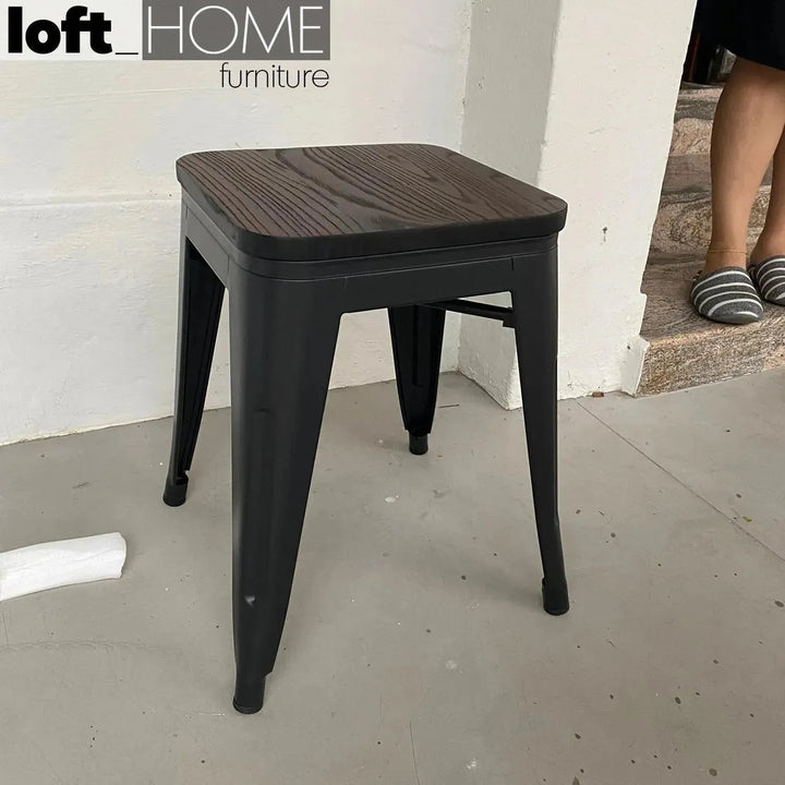 Industrial elm wood dining stool sanctum x in panoramic view.