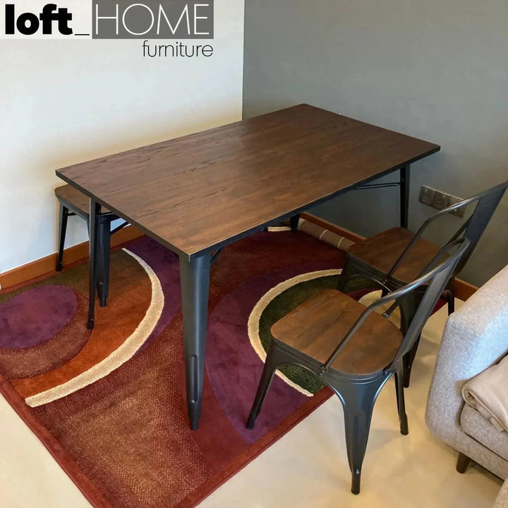 Industrial elm wood dining table sanctum x in still life.