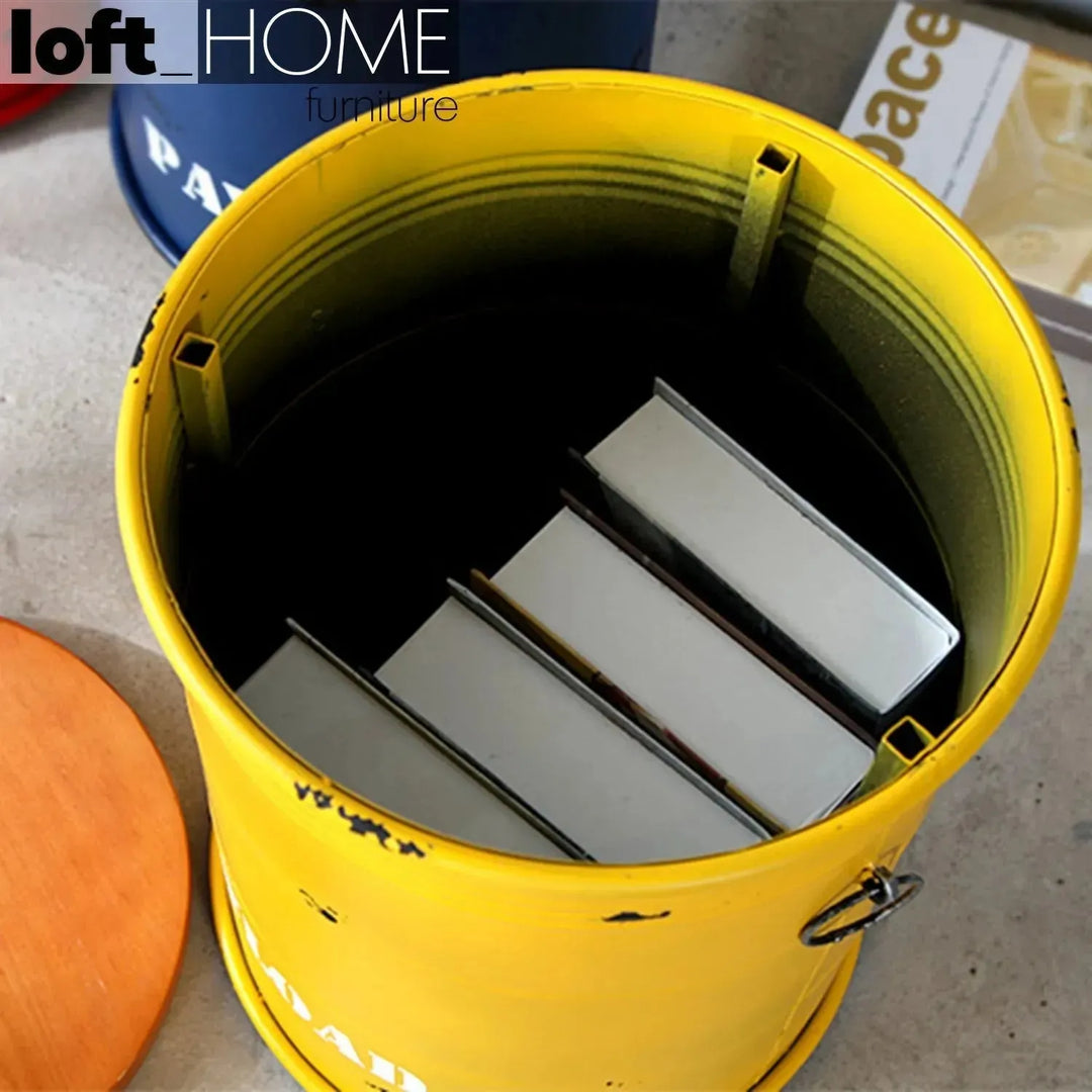 Industrial metal side table container round in close up details.