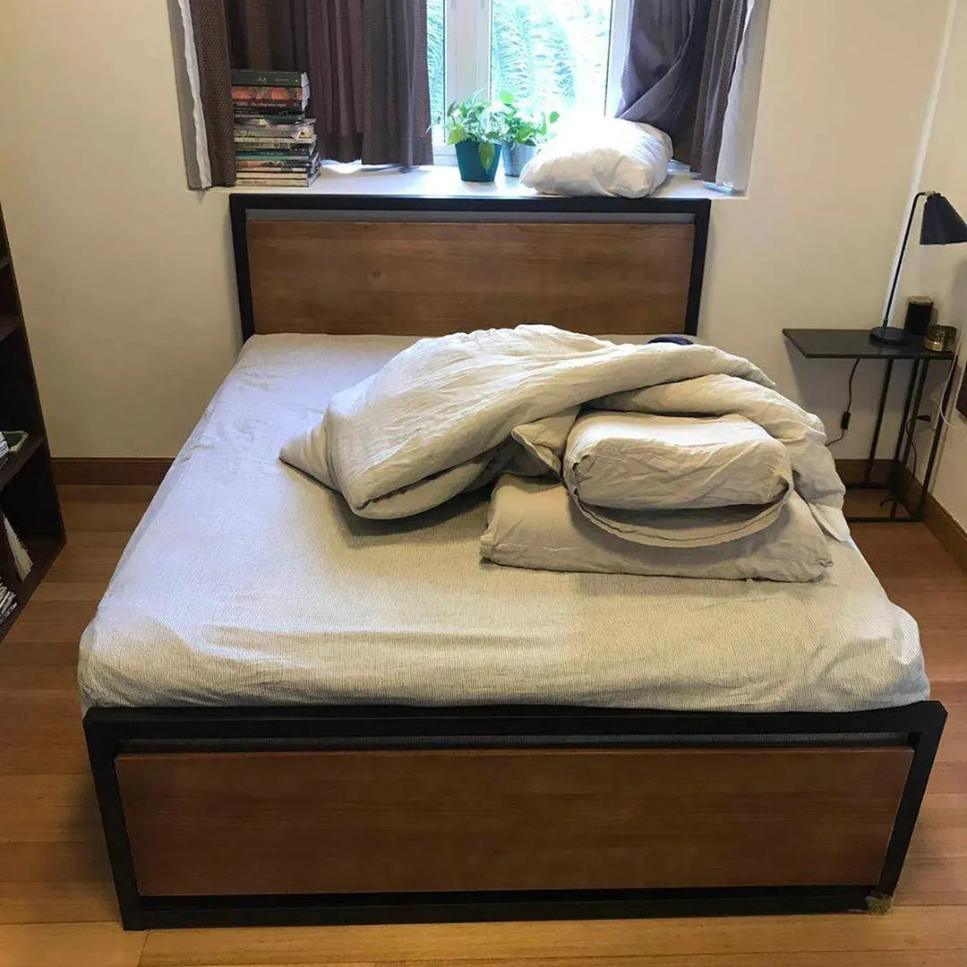 Industrial pine wood bed classic in panoramic view.