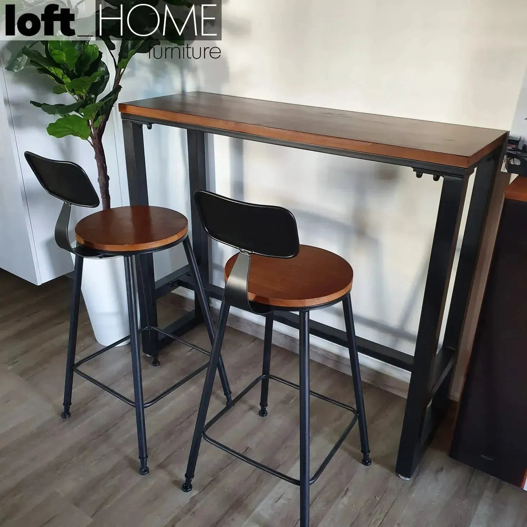 Industrial pine wood round bar chair starbuck wood in close up details.