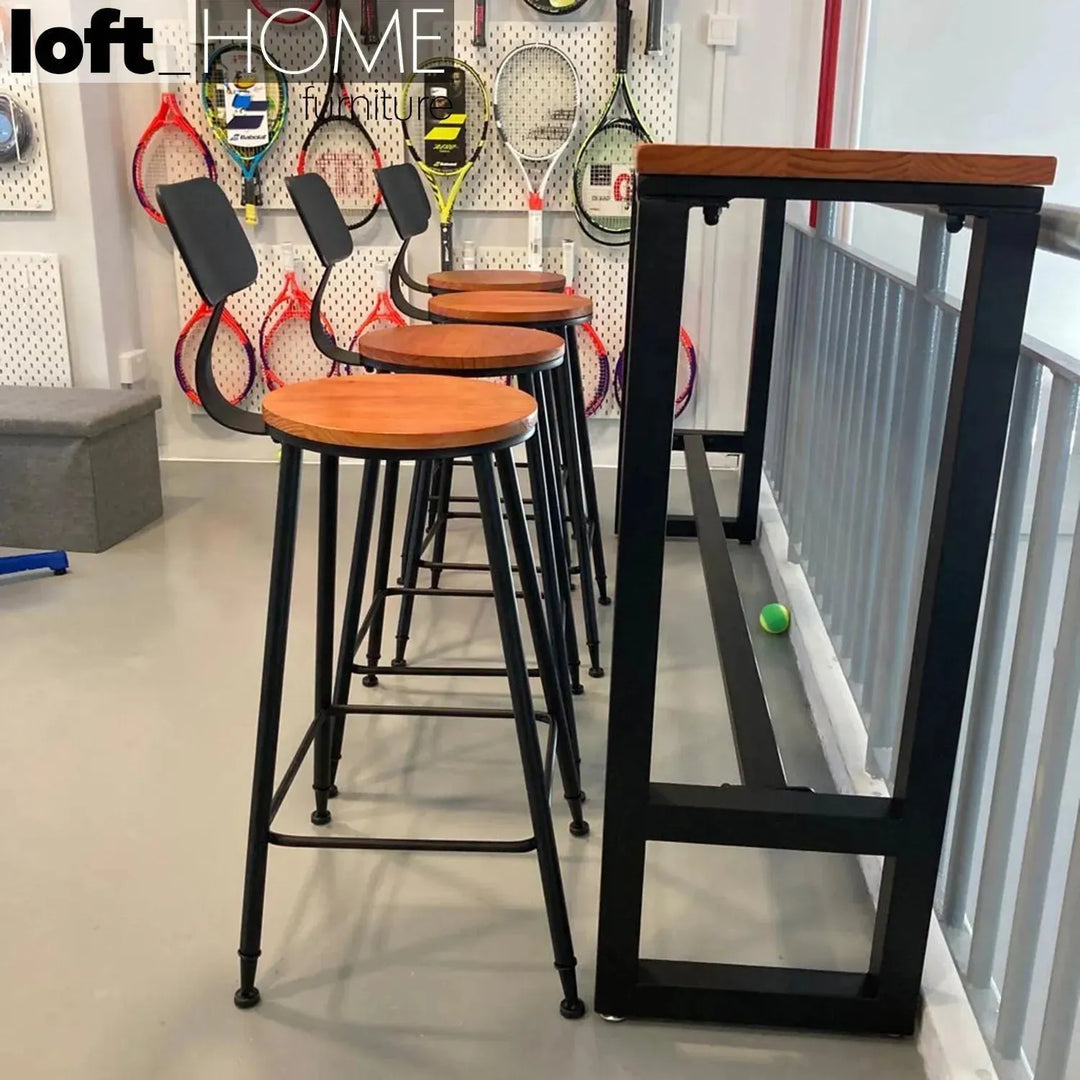 Industrial pine wood round bar chair starbuck wood in panoramic view.