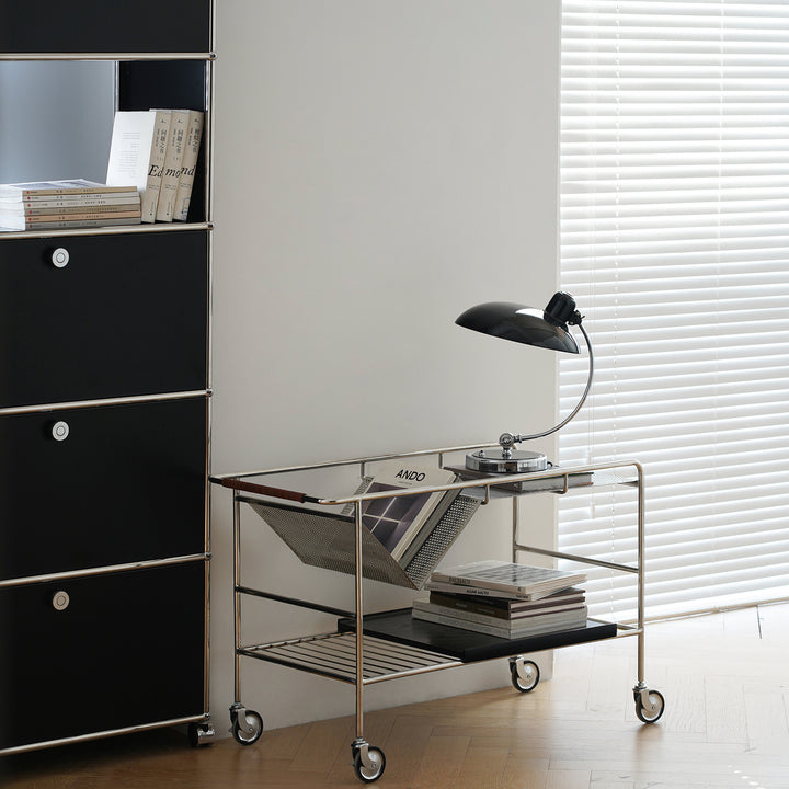 Industrial steel wheeled trolley side table manda in panoramic view.