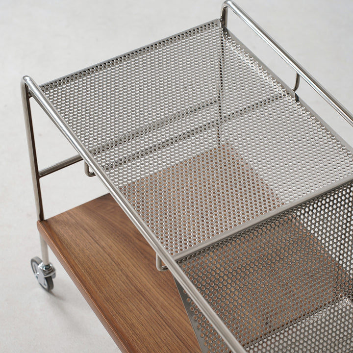 Industrial steel wheeled trolley side table manda with context.