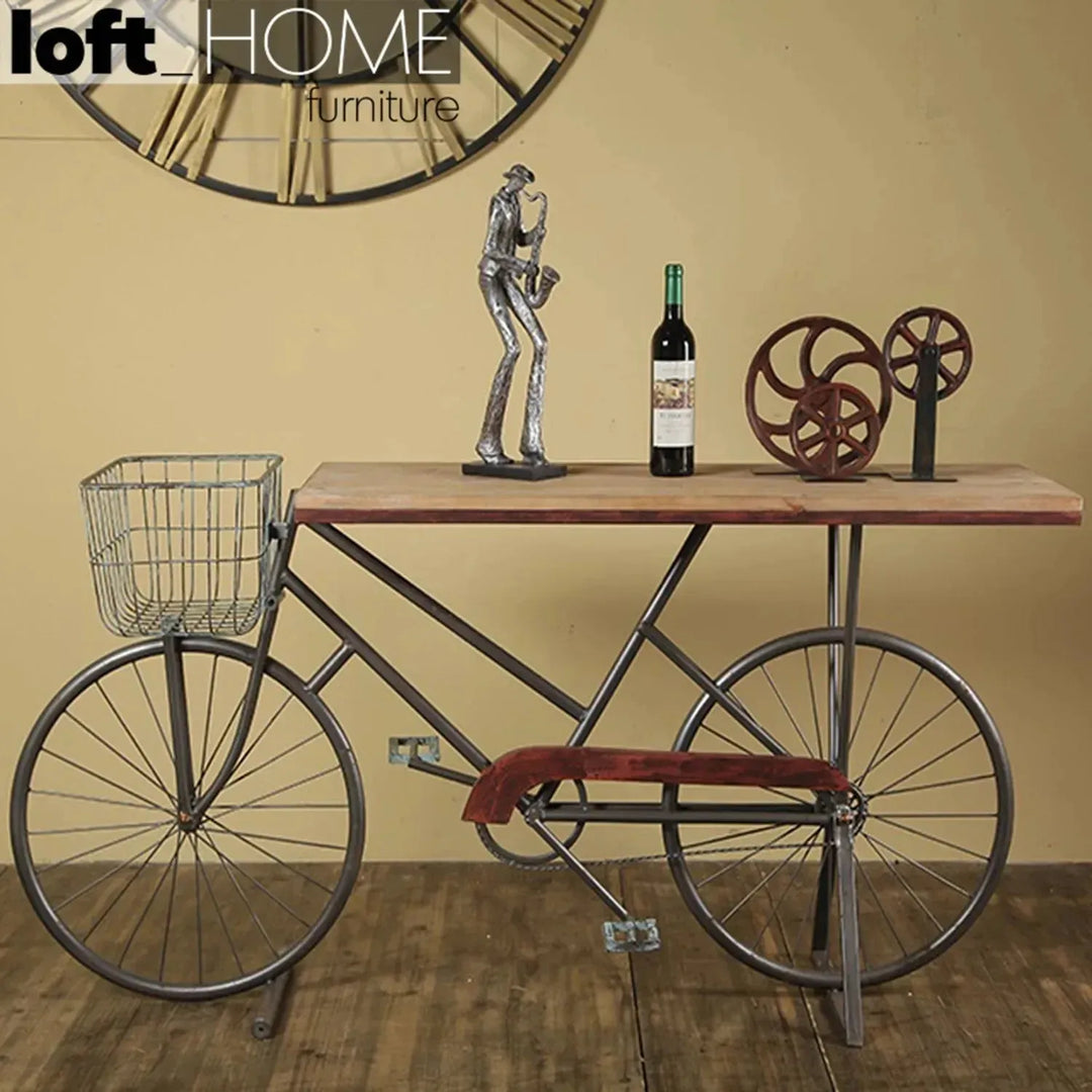 Industrial wood study table bicycle in still life.