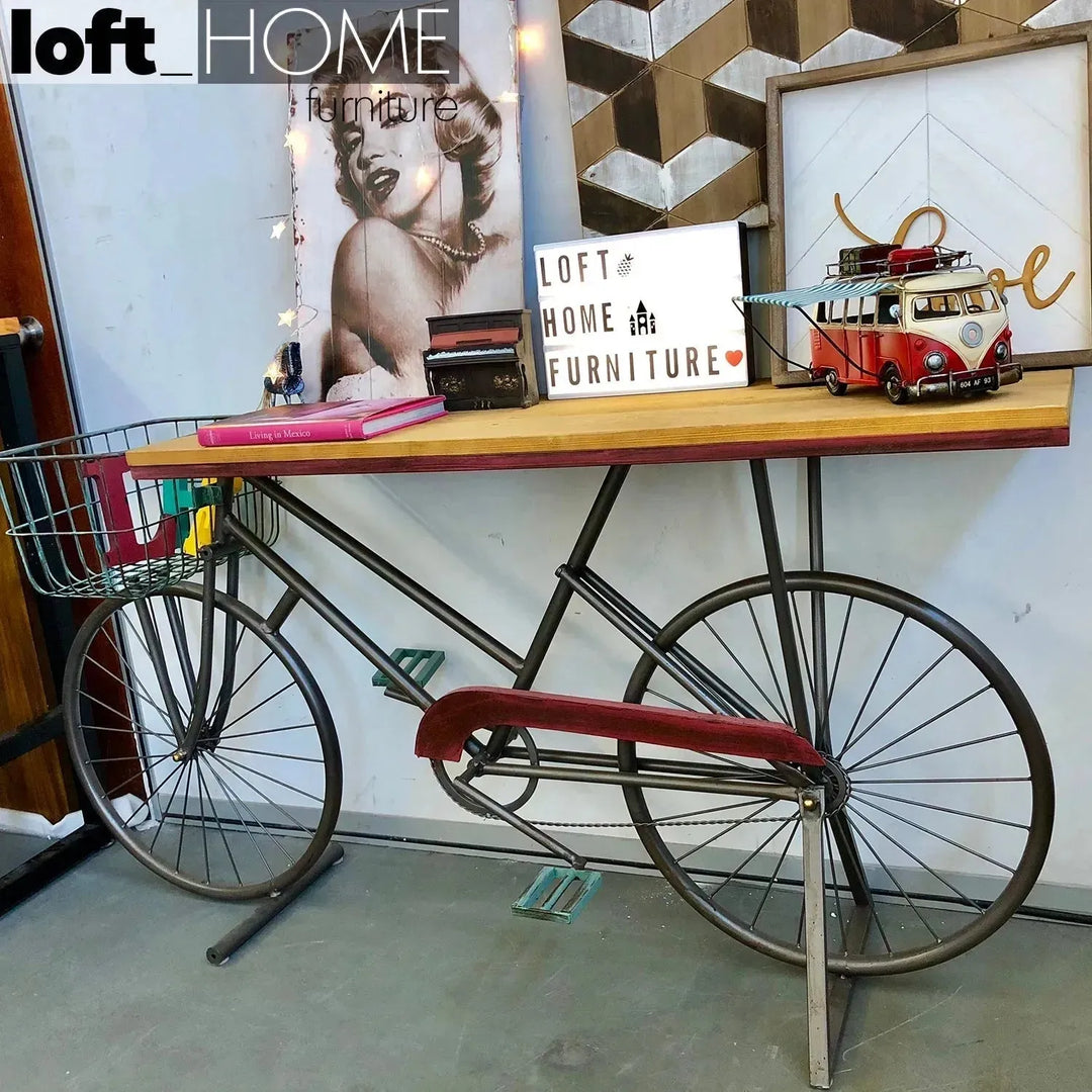 Industrial wood study table bicycle with context.