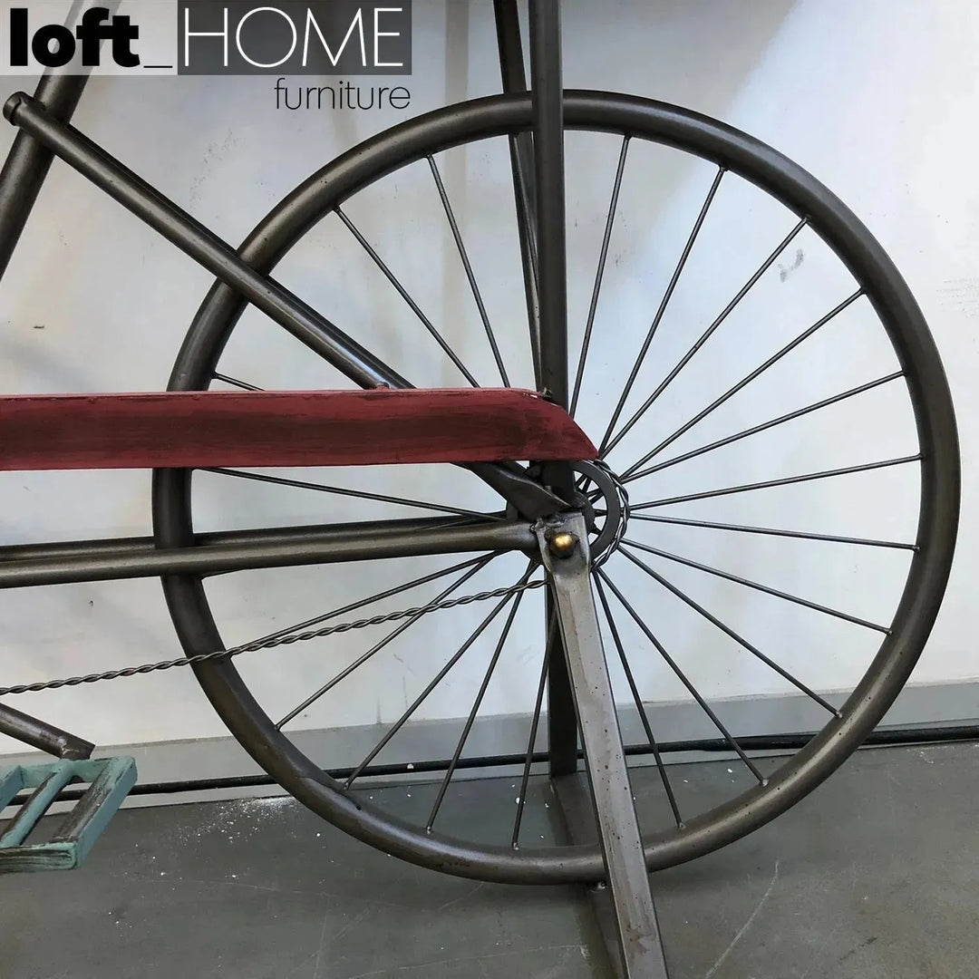 Industrial wood study table bicycle in close up details.