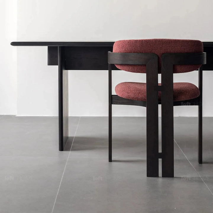 Japandi boucle fabric/leather dining chair semi circle in panoramic view.