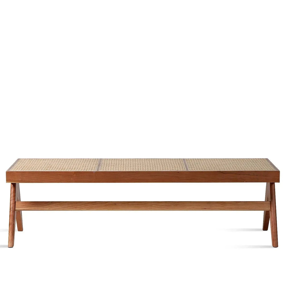 Scandinavian rattan dining bench jeanneret in white background.
