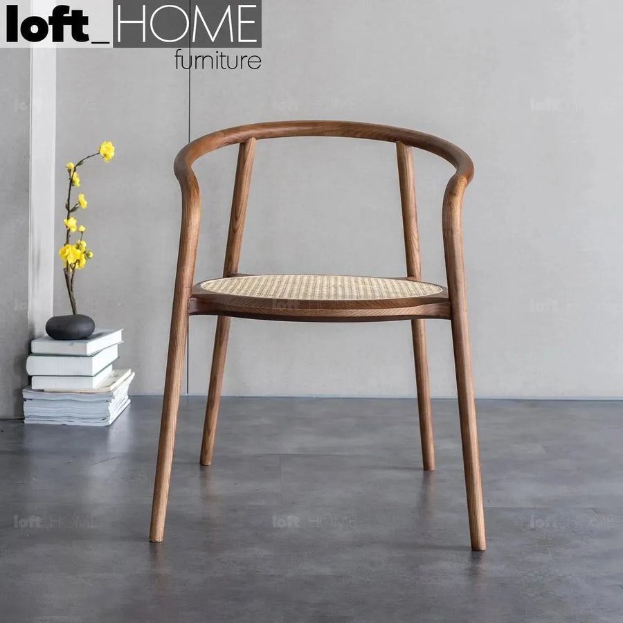 Japandi rattan dining chair circular primary product view.