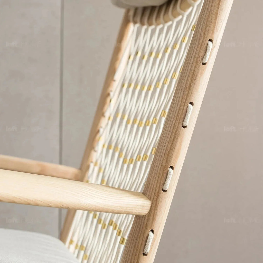 Japandi rope woven rocking chair hans wegner in still life.