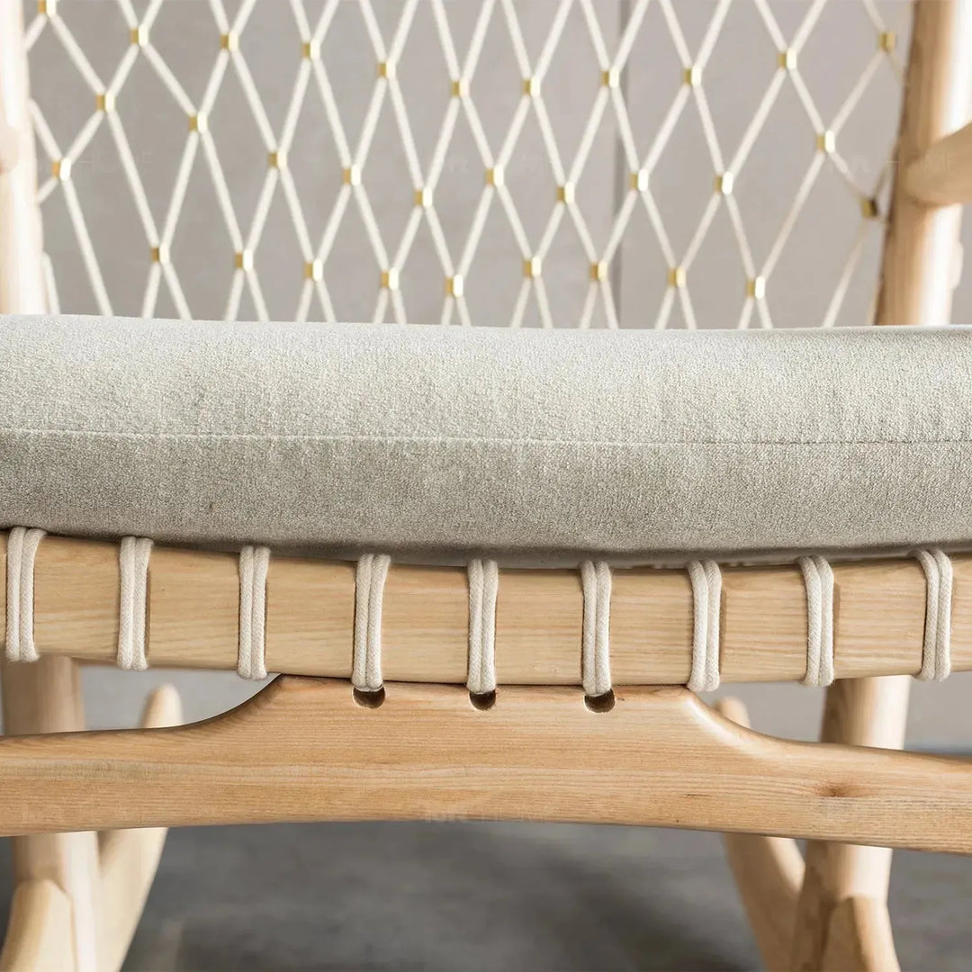 Japandi rope woven rocking chair hans wegner in panoramic view.