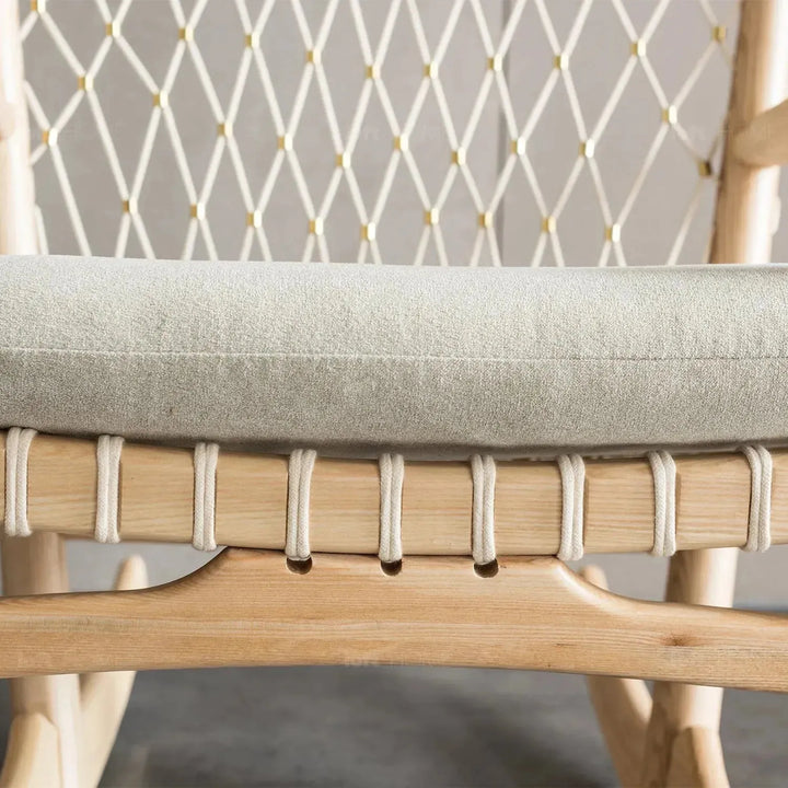 Japandi rope woven rocking chair hans wegner in panoramic view.