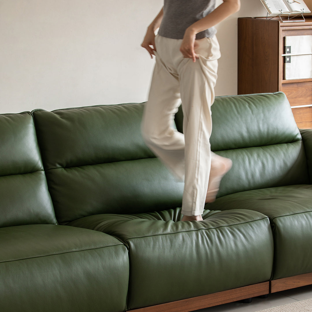 Japandi walnut wood genuine leather electric recliner 4 seater sofa edgeless in panoramic view.