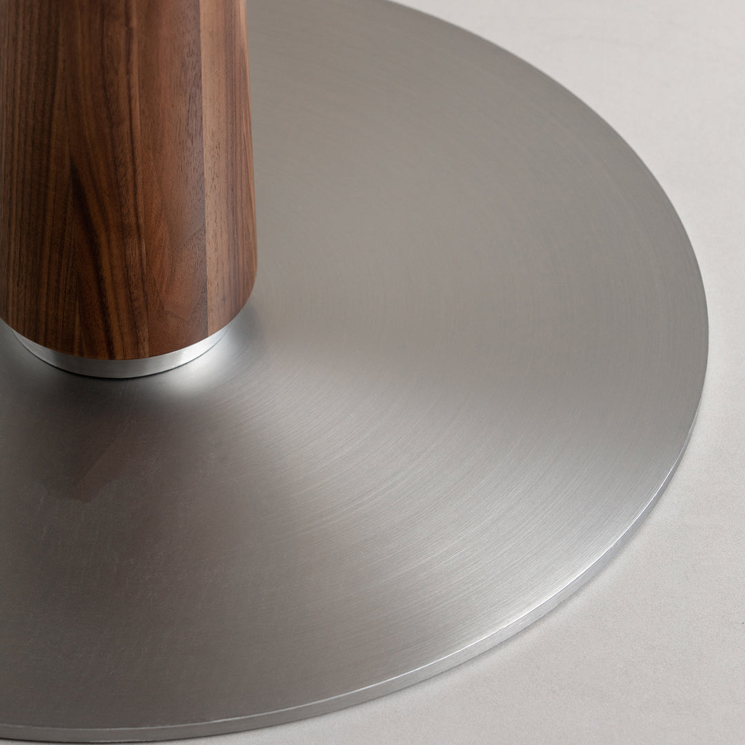 Japandi walnut wood sintered stone round dining table grey in panoramic view.