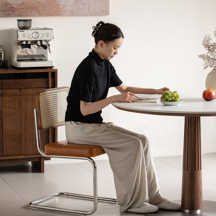 Japandi walnut wood sintered stone round dining table grey material variants.