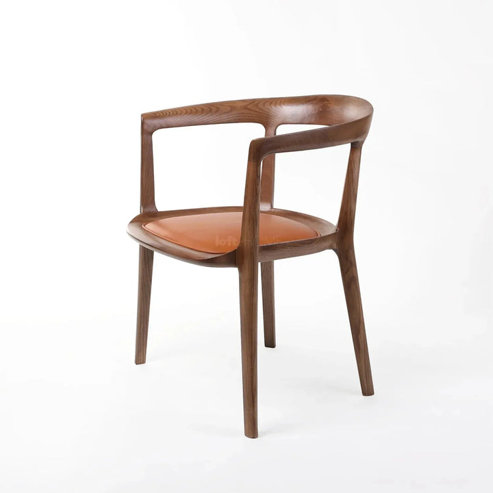 Japandi wood dining chair hero in still life.