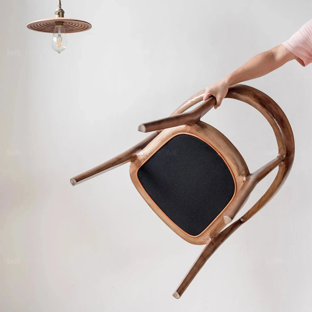 Japandi wood dining chair hero in panoramic view.