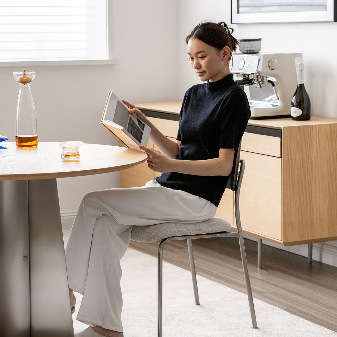 Minimalist ash wood veneer cotton fabric dining chair black aeri with context.