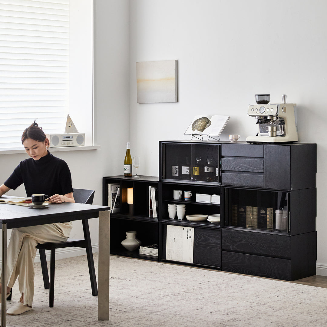Minimalist ash wood veneer modular cabinet shadow in still life.