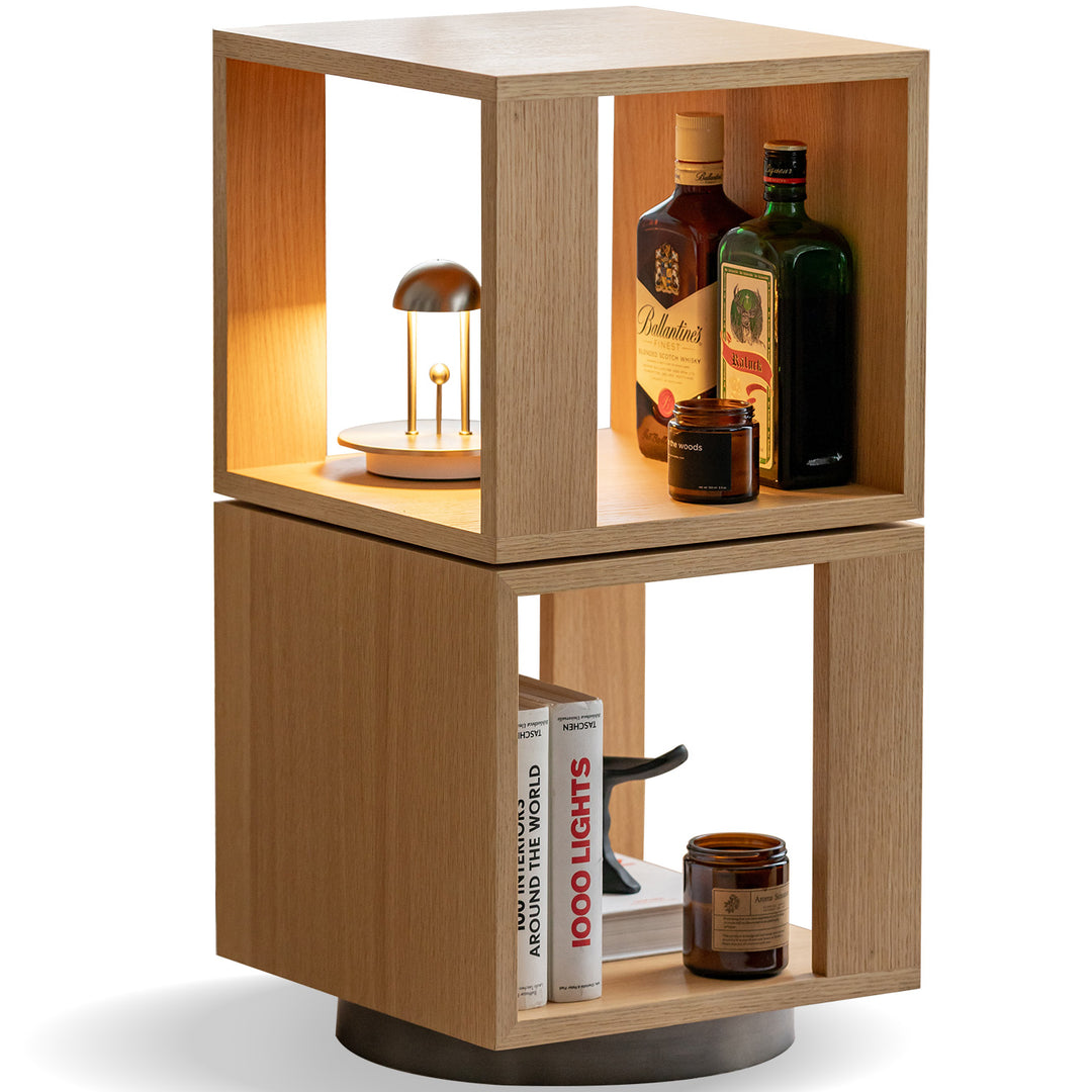 Minimalist ash wood veneer revolving side table axel in white background.