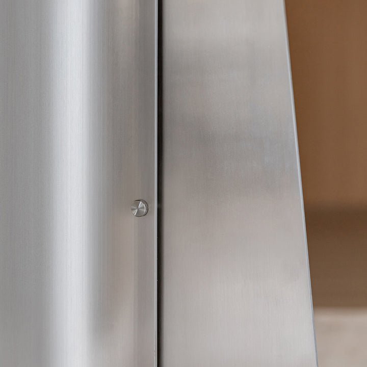 Minimalist ash wood veneer stainless steel round dining table aeri in close up details.