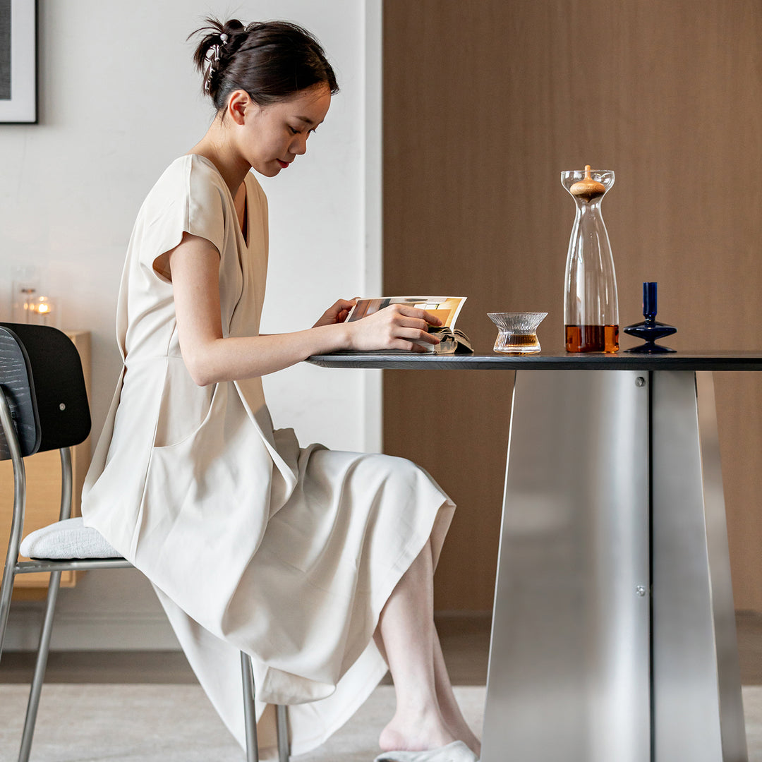 Minimalist ash wood veneer stainless steel round dining table black aeri with context.