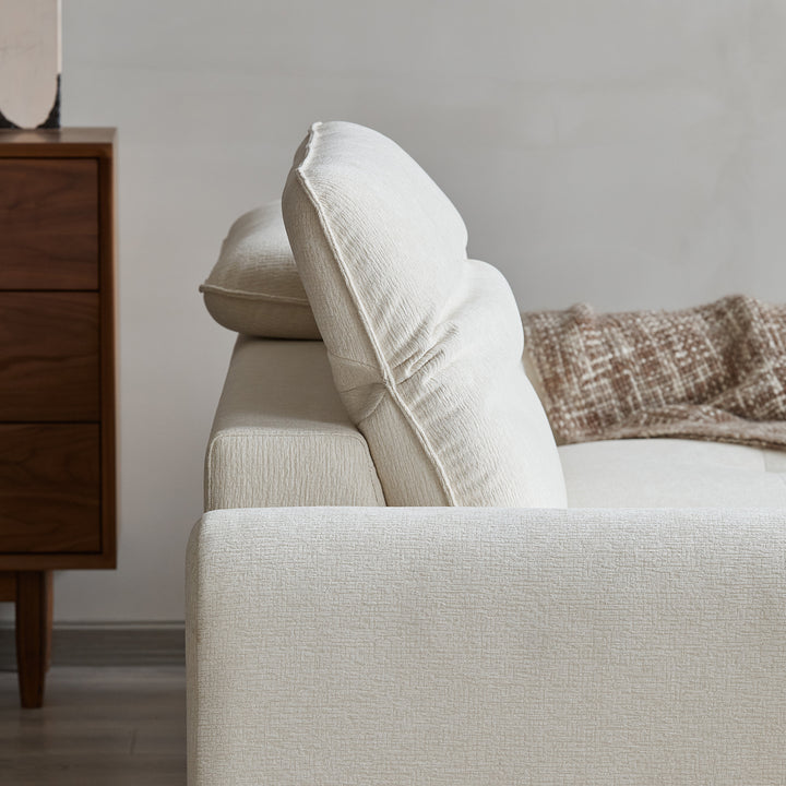 Minimalist chenille velvet fabric 1 seater sofa drift in close up details.