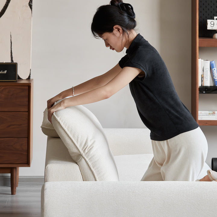 Minimalist chenille velvet fabric 3 seater sofa drift in still life.