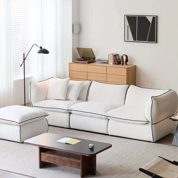 Minimalist chenille velvet fabric 4 seater sofa cloud in close up details.