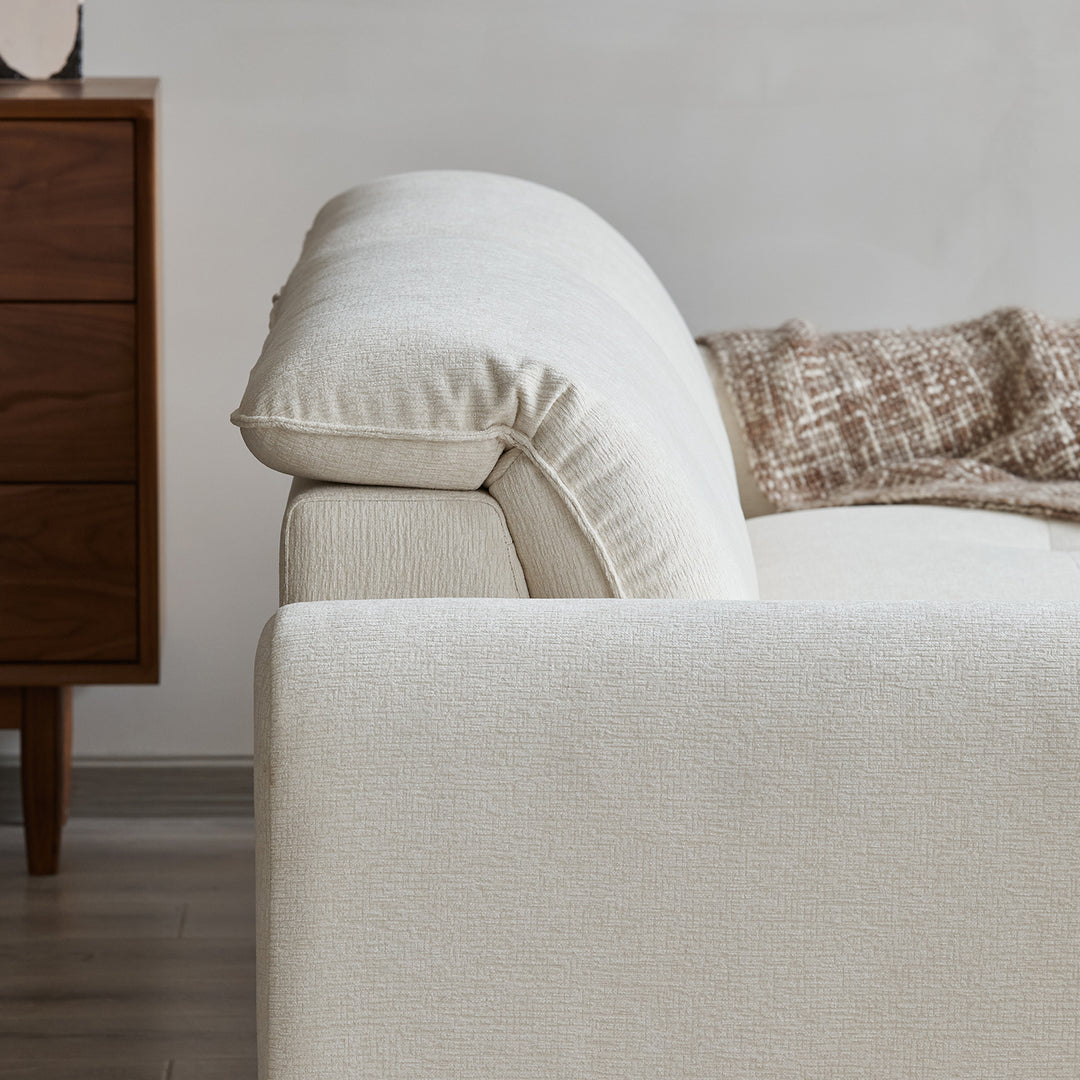 Minimalist chenille velvet fabric 4 seater sofa drift in close up details.