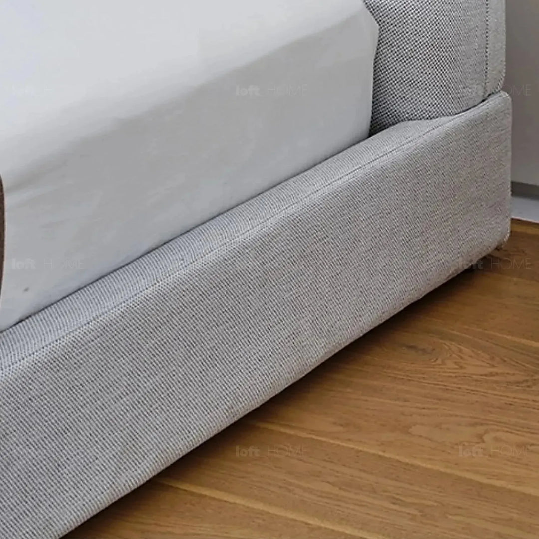 Minimalist fabric bed lines layered structure.