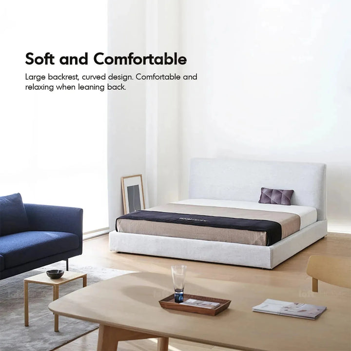 Minimalist fabric bed lines with context.